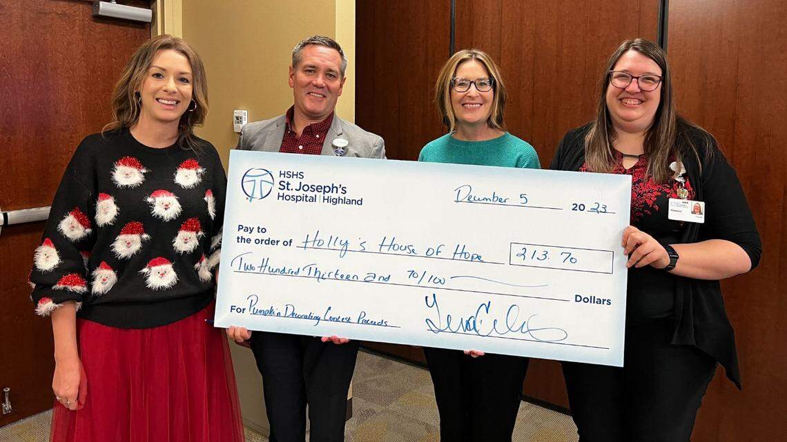 HSHS St. Joseph’s Hospital Highland recently donated over $200 to Holly’s House of Hope from the proceeds raised through a pumpkin decorating contest they held at the hospital in October. St. Joseph’s Hospital expresses their gratitude to all who contributed to the success of their mission-driven event which led to this donation. Shown at the check presentation are (left to right) Teresa Cornelius, chief operating officer and chief nursing officer; Chris Klay, president and CEO; Tammy Wrobbel, Holly’s House of Hope representative; and Rebecca Niemerg, supervisor of mission integration and spiritual care.