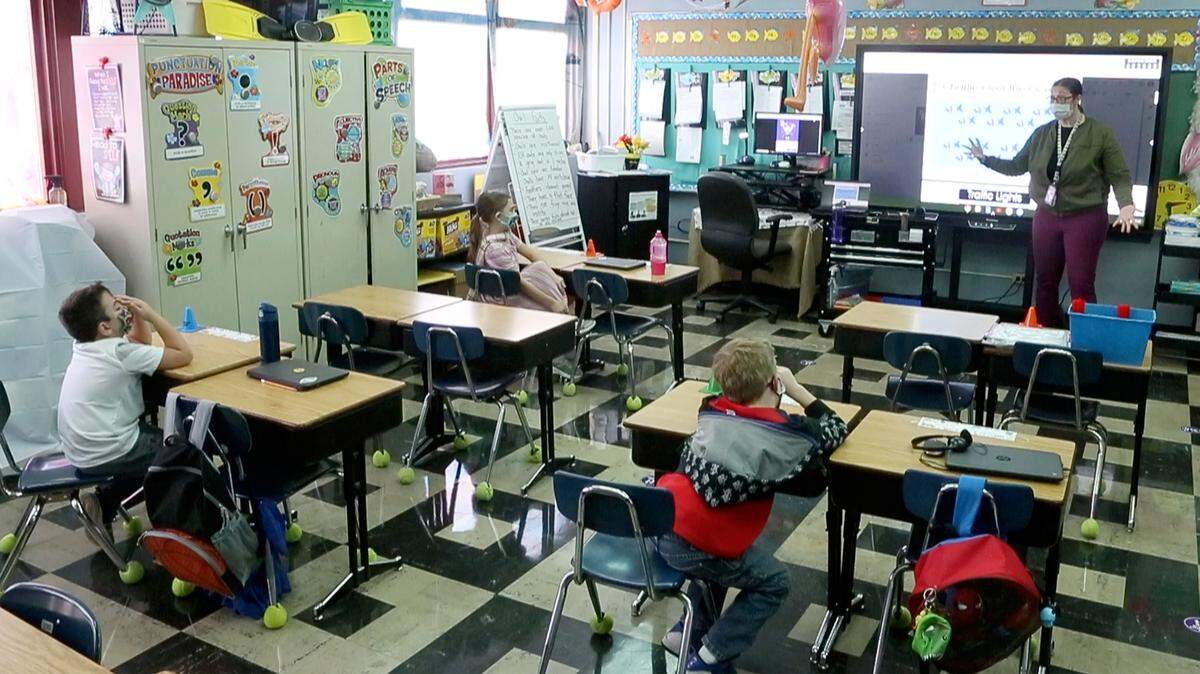 Collinsville School District 10 music teacher, Jennifer Bhooshan, teaches students at Webster Elementary school. With COVID-19 restrictions Bhooshan has become very creative in the way she teaches music, since students are not allowed to share instruments.