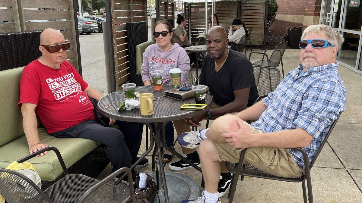 David Semrau, left to right, meets for lunch with Diane Burrelsman, Nolan Ferguson and Chuck Wood, who have been trying to help him find permanent housing since his eviction on May 31.