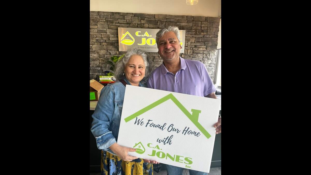 Jai and Phalita Sharma posed for a promotional photo when they hired C.A. Jones, Inc. to build them a $550,000 home in Chatham, near Springfield. Now they’re suing the metro-east contractor.