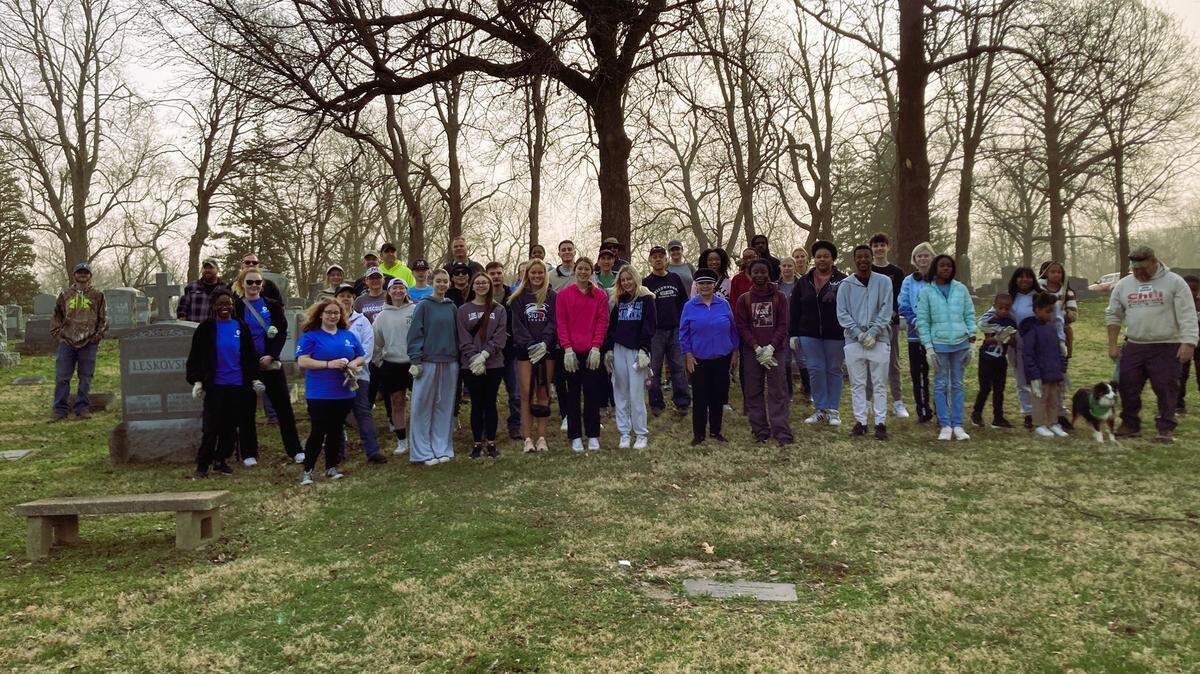 Belleville AmeriCorps service workers and other community volunteers gathered last month for a clean-up of Mount Hope Cemetery, which the city bought earlier this year.