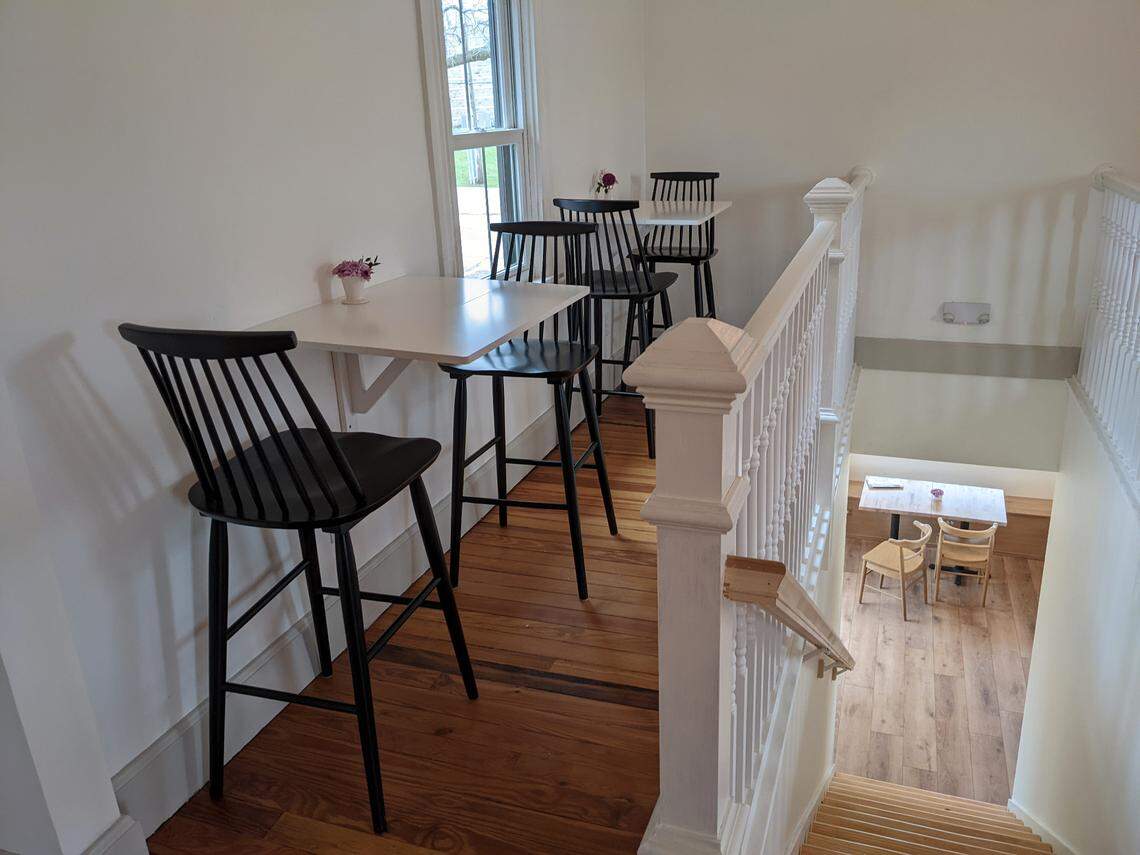 Second-floor seating area at June’s