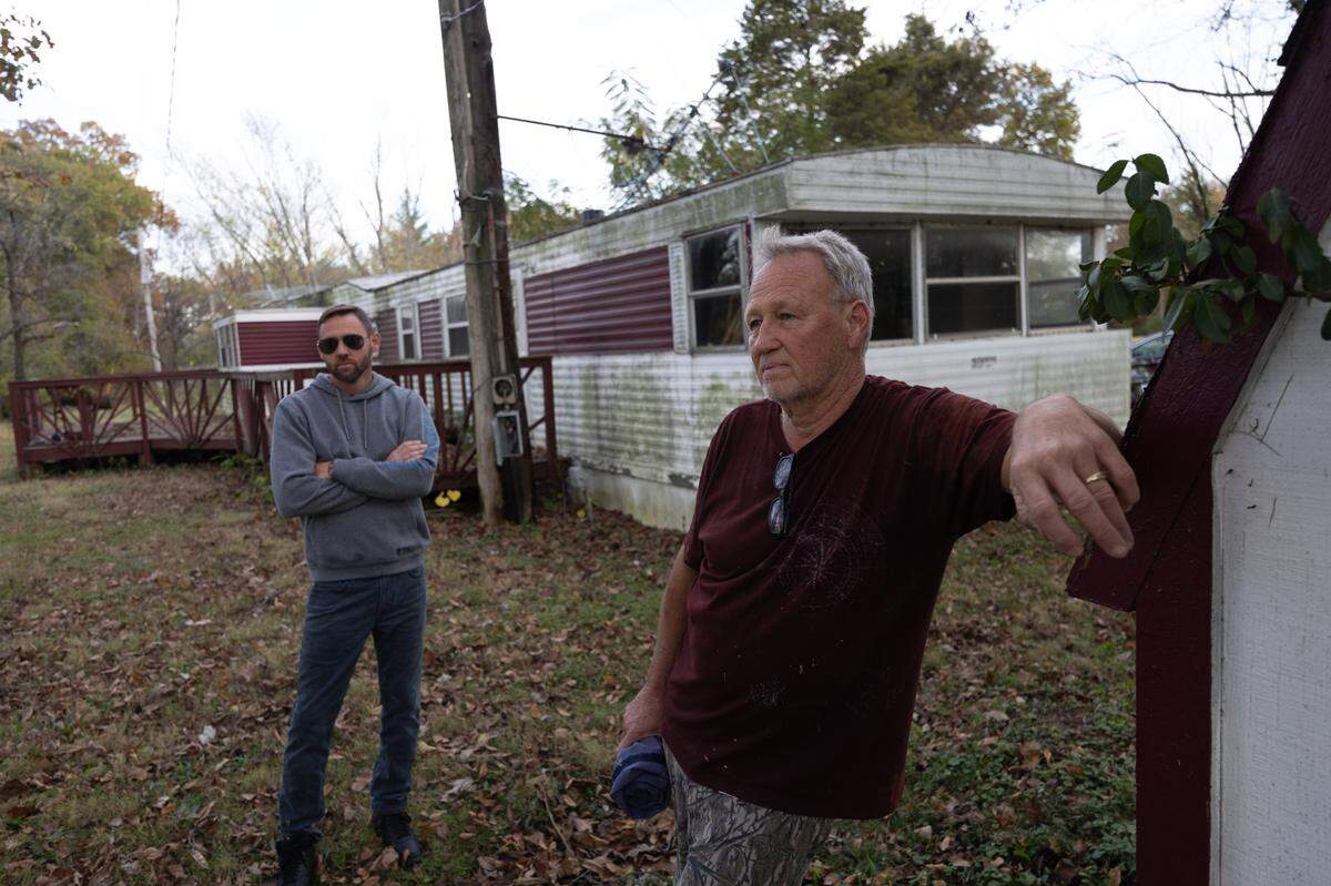 Rick Shinn, right, and his son, Aaron Shinn, check on a mobile home that Rick Shinn inherited from his father, Maurice Shinn, 20 years ago and used as a clubhouse. It sits on land leased from George E. Hilgard American Legion Post 58 in rural Freeburg.