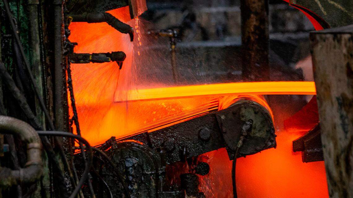 This file photo shows steel move through the production process as it is thinned and then coiled at U.S. Steel in Granite City.