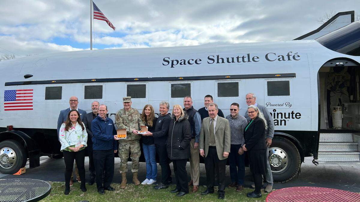 The Leadership Council, in partnership with Soulcial Kitchen, recently presented 200 food tokens from the Currency of Caring Program to Col. Chris Robinson from Scott Air Force Base. Pictured left to right: Kyle Anderson, Executive Director - Leadership Council Southwestern Illinois; Amanda Reeder, President - Scott Spouses’ Club; Pat McMahan, Mayor of Mascoutah; Gary Hoelscher, Vice President - Millennia Professional Services & President - Leadership Council Southwestern Illinois; Col. Chris Robinson, 375th Air Mobility Wing & Installation Commander; Holly Michel, Soulcial Kitchen Founder; John Michel, Soulcial Kitchen Founder, Retired Brigadier General - U.S. Air Force; Anita Leach, Executive Director - St. Louis Federal Executive Board; Jay Korte, Director of Client Relations - The Korte Company; Scott Raether, Employment Program Manager - Scott Air Force Base Military & Family Readiness Center; Bob Weilmuenster, Mayor of Shiloh; J. Scot Heathman, Founder/Owner - Elevating Others, Retired Colonel - U.S. Air Force (375th Air Mobility Wing & Installation Commander); Tom Kane, Airlift/Tanker Association, Retired Major General - U.S. Air Force; Laura Neuman-Howe, Executive Director - Friends of Fisher House St. Louis.