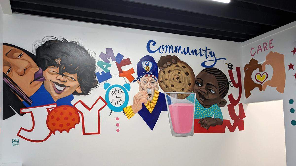 Wall mural created by artist Cbabi Bayoc at Hot Box Cookies in O’Fallon