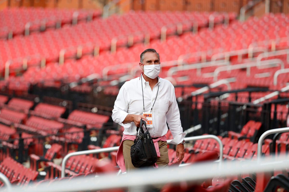 St. Louis Cardinals President of Baseball Operations John Mozeliak is seen during baseball practice at Busch Stadium in the summer of 2020. On Tuesday, Mozeliak said one player and four staff members had tested positive for coronavirus.