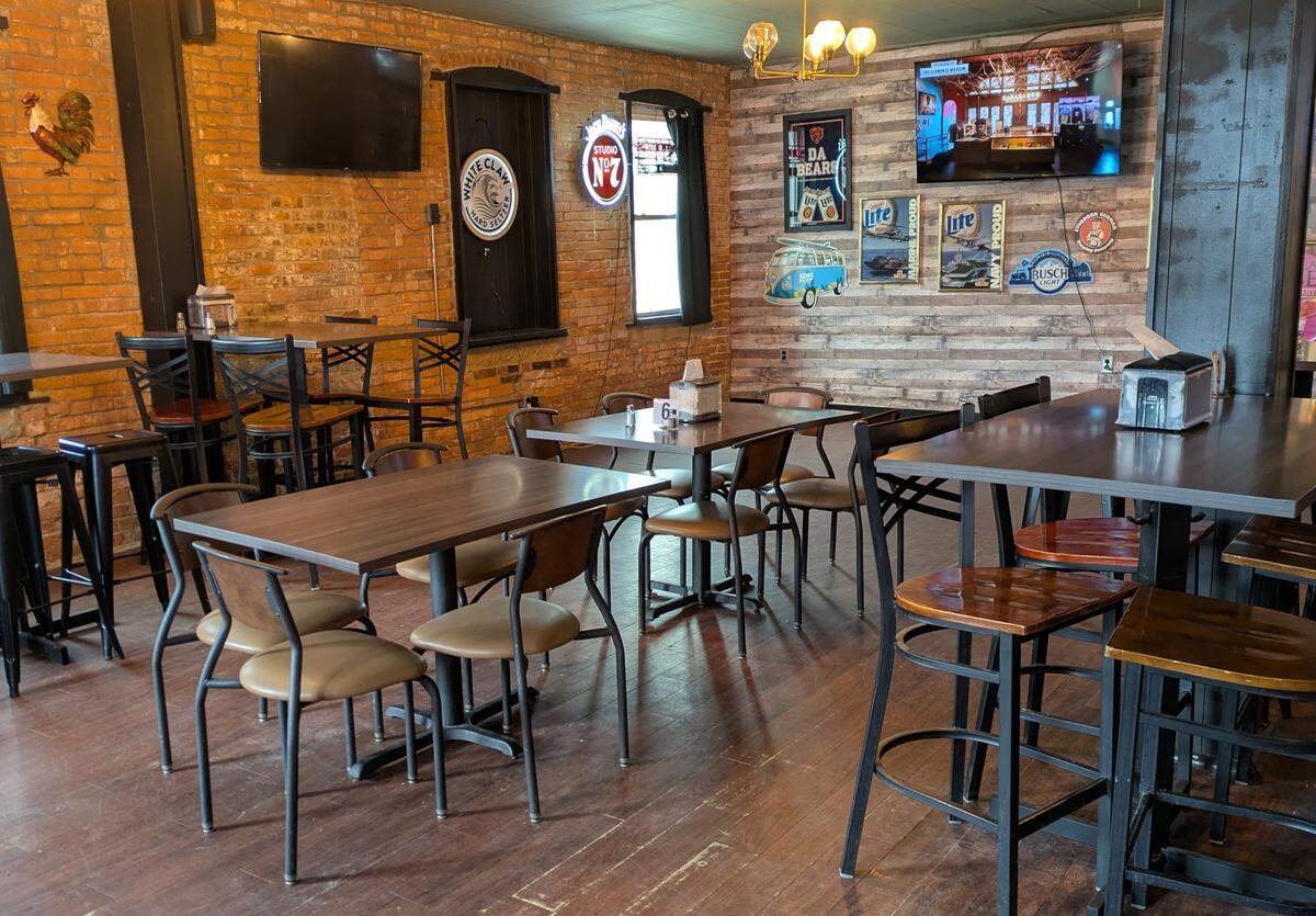High-top and regular tables are available in addition to bar seating at The Roost.