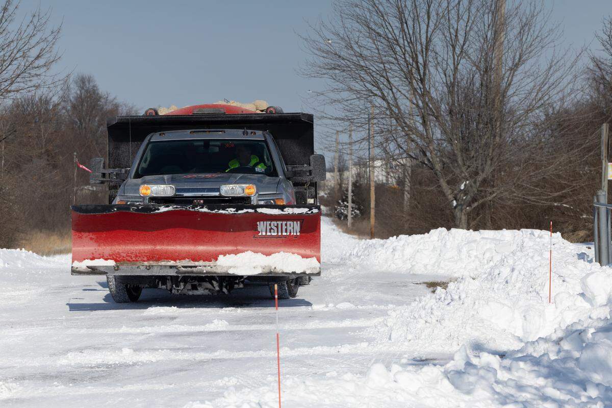 A snow plow drives through St. Ellen Mine Park in O’Fallon Jan. 26, 2026, after heavy snowfall inundated the metro-east over the weekend.