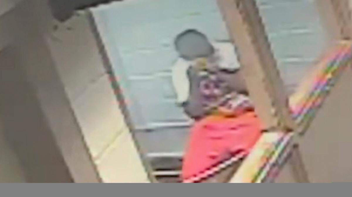 A Teen in police custody reacts after being exposed to an irritant in East St. Louis, Illinois jail in 2019.