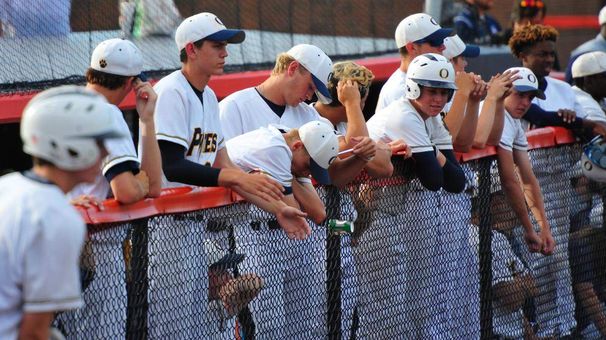 O'Fallon players watch as Sandburg is up 3-0 as the Panthers are down to their final out in the Class 4A University of Illinois Supersectional. Monday, June 4, 2018