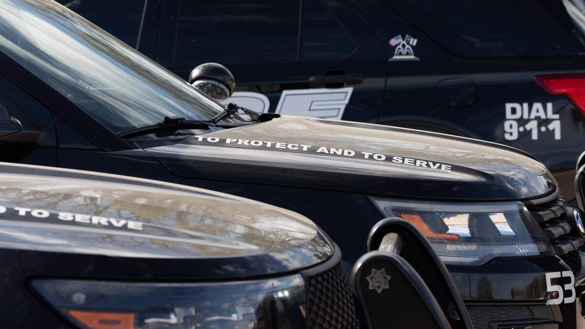 Belleville police cruisers sit at the Belleville police headquarters.