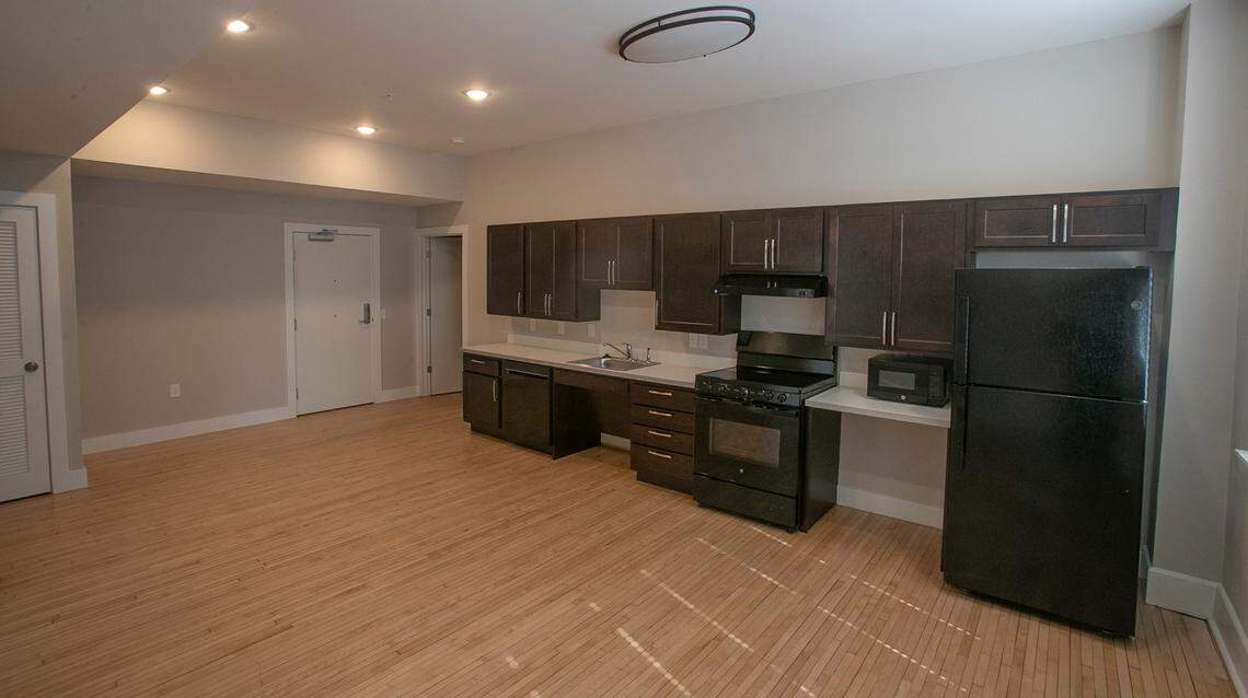 Developers who turned the former Granite City YMCA building into an apartment complex saved the original maple floor of the dance studio, which was divided into two apartments.