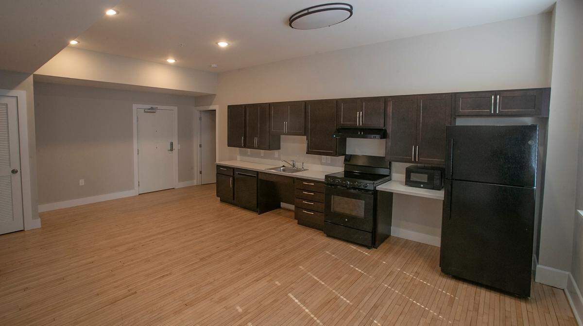 Developers who turned the former Granite City YMCA building into an apartment complex saved the original maple floor of the dance studio, which was divided into two apartments.