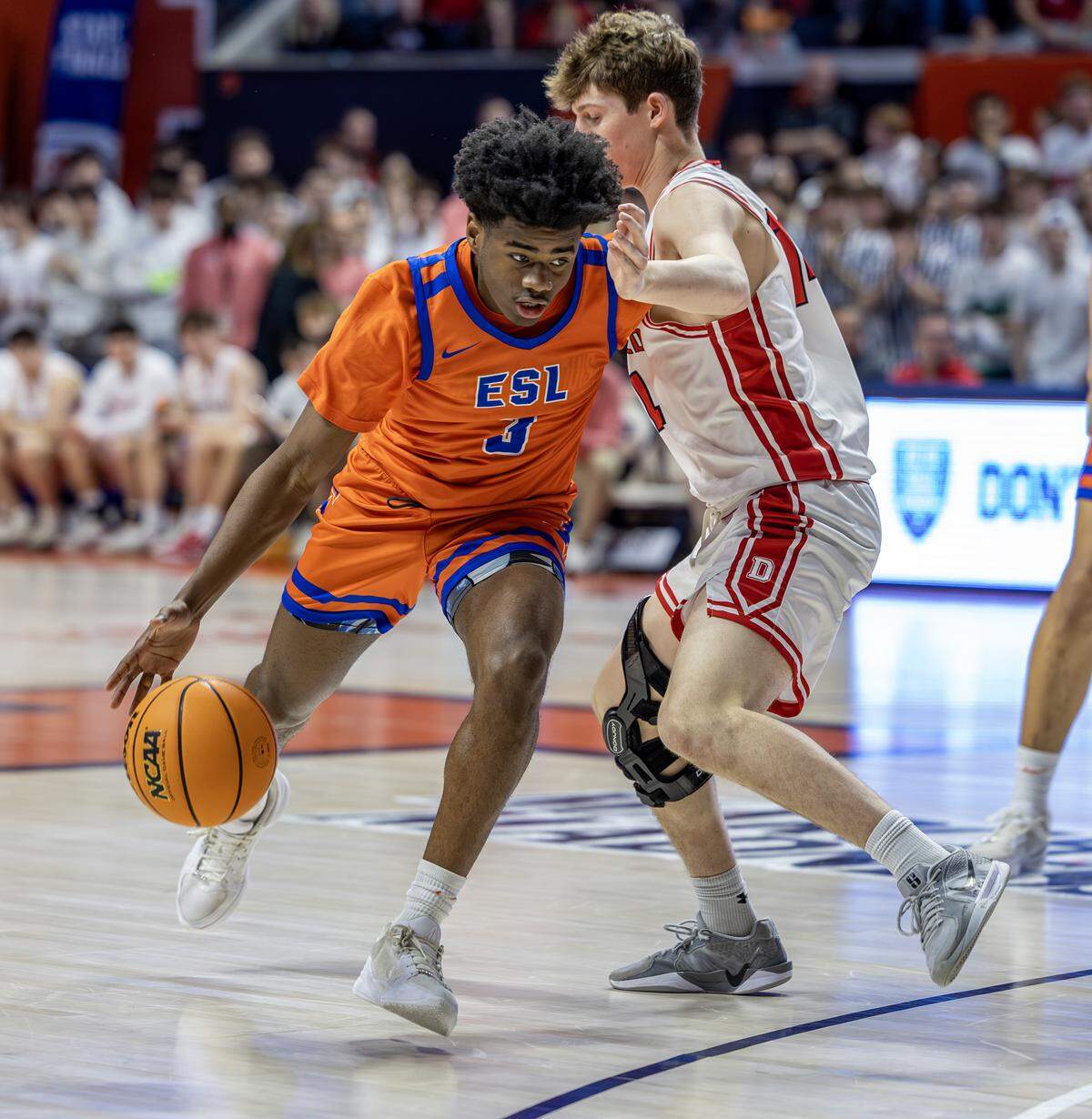 East St. Louis forward Terriyon Webster makes a move past a Deerfield defender during the IHSA Class 3A state championship game at the State Farm Center in Champaign Saturday.