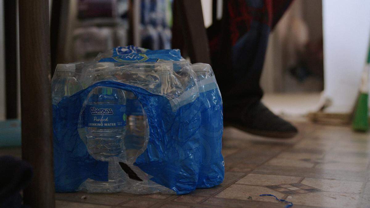 William McNeal, 73, doesn’t drink the water from the tap -- not even after he boils it. He uses bottled water provided by legal firm Equity Legal Services to cook, drink and brush his teeth.