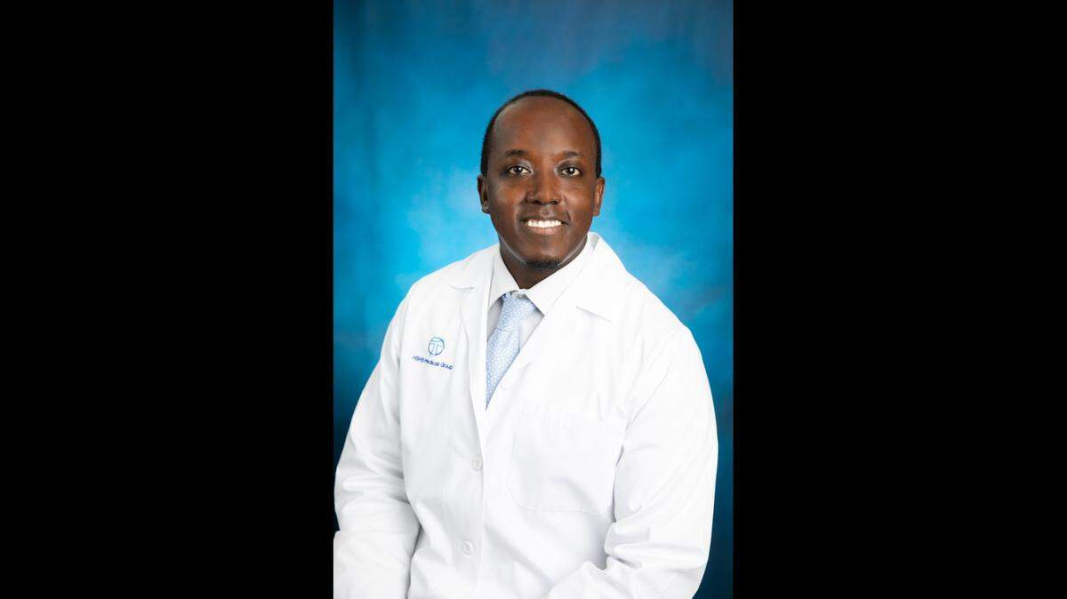 Albert Kombe, M.D.