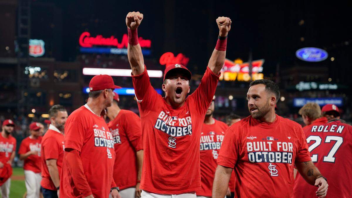 St. Louis Cardinals’ Lars Nootbaar celebrates with teammates after defeating the Milwaukee Brewers in a baseball game to clinch a playoff spot Tuesday, Sept. 28, 2021, in St. Louis. (AP Photo/Jeff Roberson)