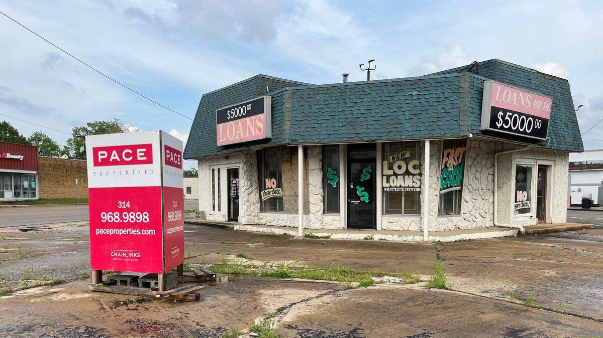 One of the derelict vacant buildings at the intersection of West Main Street and North Belt West in Belleville formerly housed a quick-loan business. It may become part of a new tax-increment-financing district.