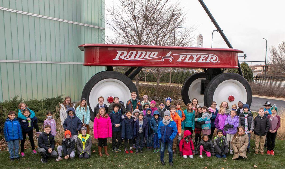 In their first year as an organization, members of the Innovators Club at St. Clare School in O’Fallon were among the top place finishers at the People of Play’s 17th Annual Young Inventor Challenge at Radio Flyer Headquarters in Chicago last month. Club members are pictured here at the Radio Flyer Headquarters.