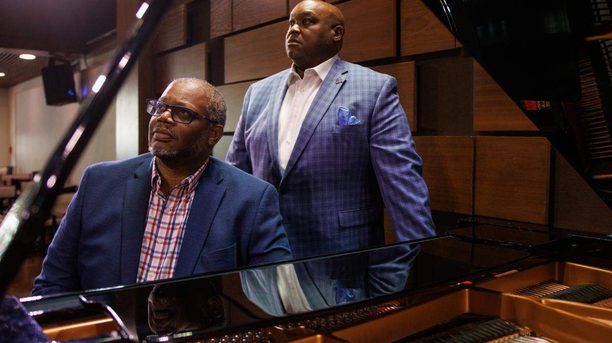 Reggie Thomas, front, and Adaron Jackson, back pose for a portrait at Jazz St. Louis on Tuesday, September 10, 2024.
