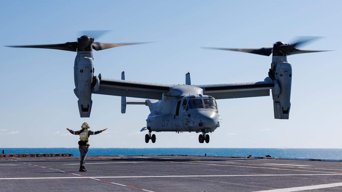 Royal Australian Navy sailor Leading Seaman Keely Hagedoorn guides a U.S. Marine Corps MV-22 Osprey during take-off and landing practice on Aug. 7, 2023. Later that month, an Osprey crash in Australia killed three Marines.