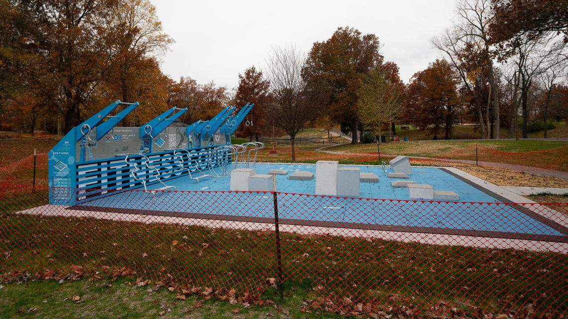 A construction fence surrounds the new Fitness Court at Bellevue Park in Belleville. The outdoor gym will be open to the public after a ribbon-cutting ceremony on Tuesday.