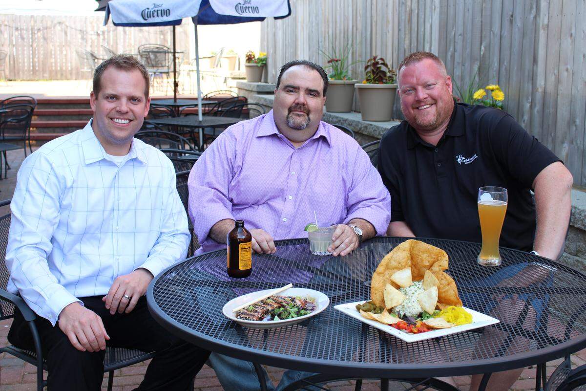 Partners John Galle, left to right, Joe Metzger and Travis Lewis own a new restaurant called The Cobblestone Eatery and Drinkery in Lebanon.