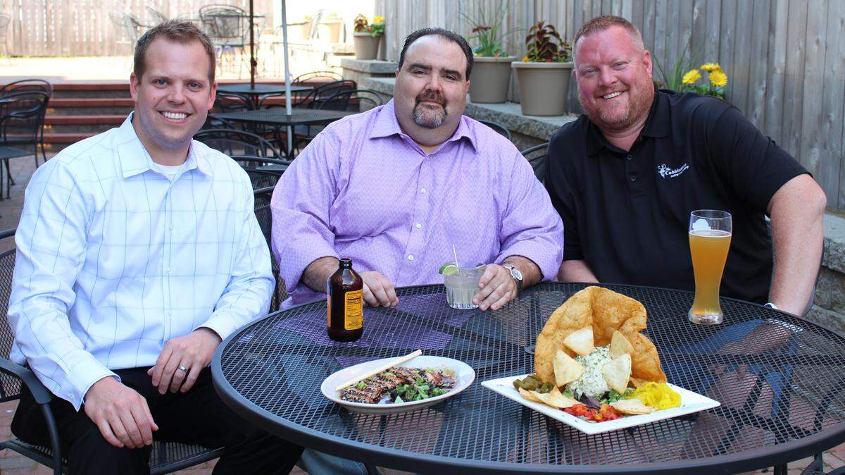 Partners John Galle, left to right, Joe Metzger and Travis Lewis own a new restaurant called The Cobblestone Eatery and Drinkery in Lebanon.