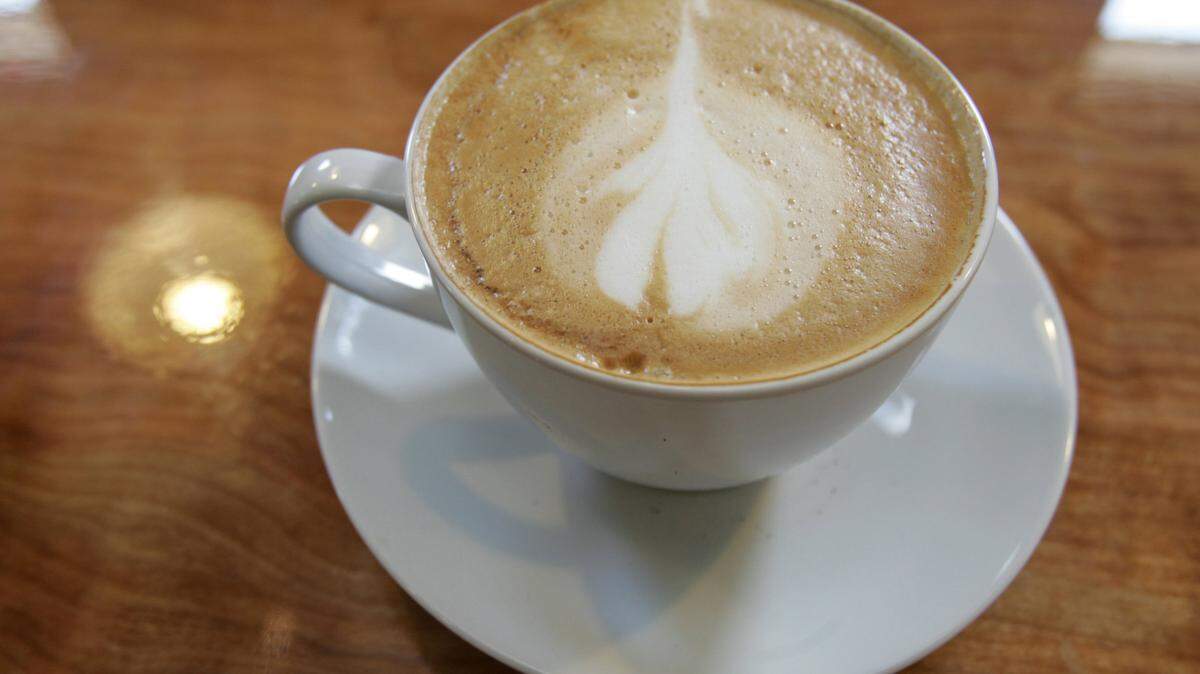 A cup o’ joe with foamy design