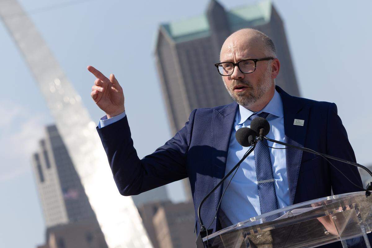 Ryan McClure, executive director for Gateway Arch Park Foundation, speaks at Malcolm W. Martin park in East St. Louis, Ill. about a proposed expansion of the Gateway Arch Park into East St. Louis.