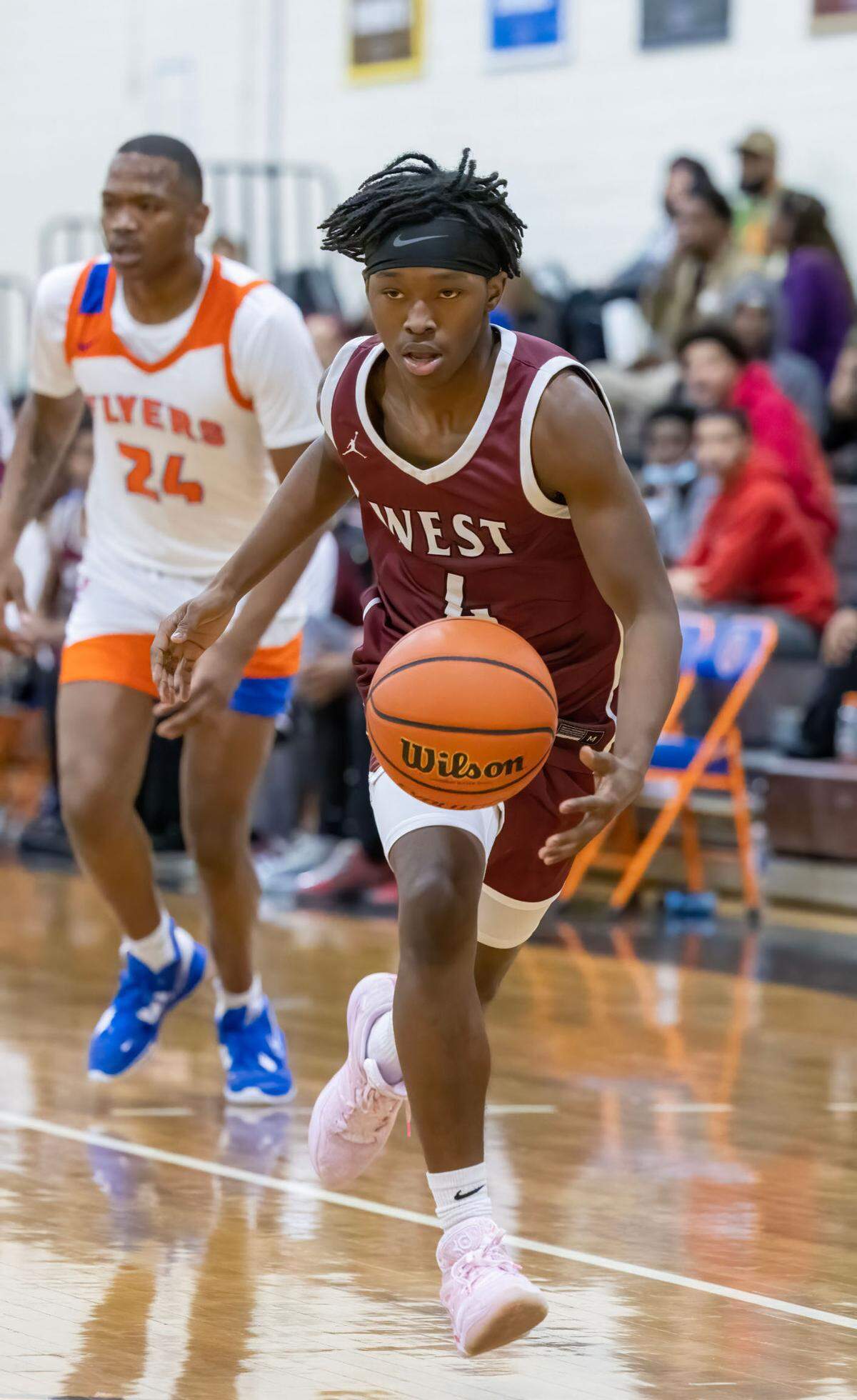 Belleville West’s Brandon Scott goes to the basket during Friday night’s Southwestern Conference game against East St. Louis. The Flyers ultimately posted an 81-52 victory.