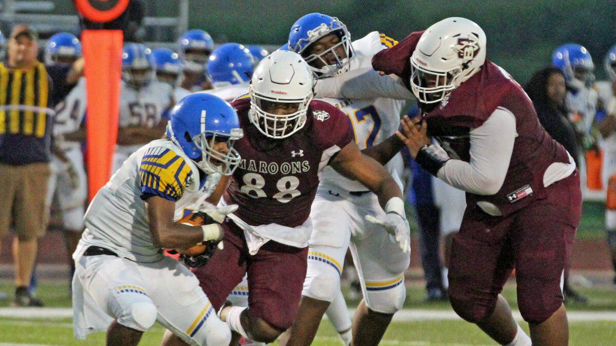 Defensive end Keith Randolph bears down on a Riverview Gardens running back during the Maroons’ 41-16 win. They kick off Southwestern Conference play with O’Fallon Friday at West.