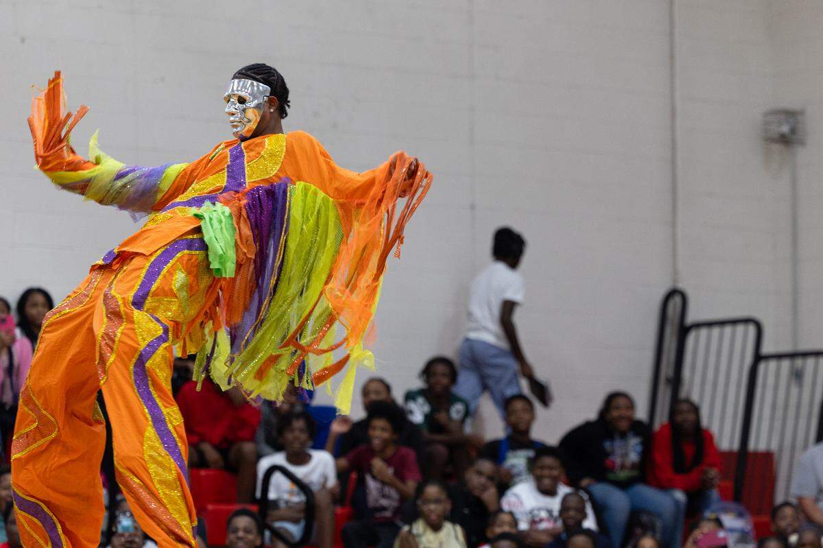 A performer for the Caribbean Carnival segment of UniverSoul Circus perform on Aug. 14, 2024 at Mason-Clark Middle School.