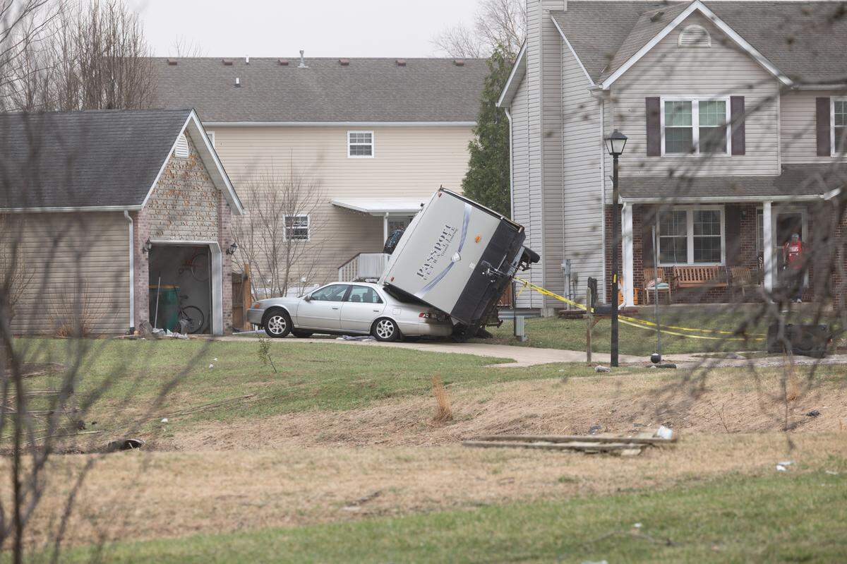 A toppled over RV in an O’Fallon neighborhood on Saturday after a storm passed through Friday night.