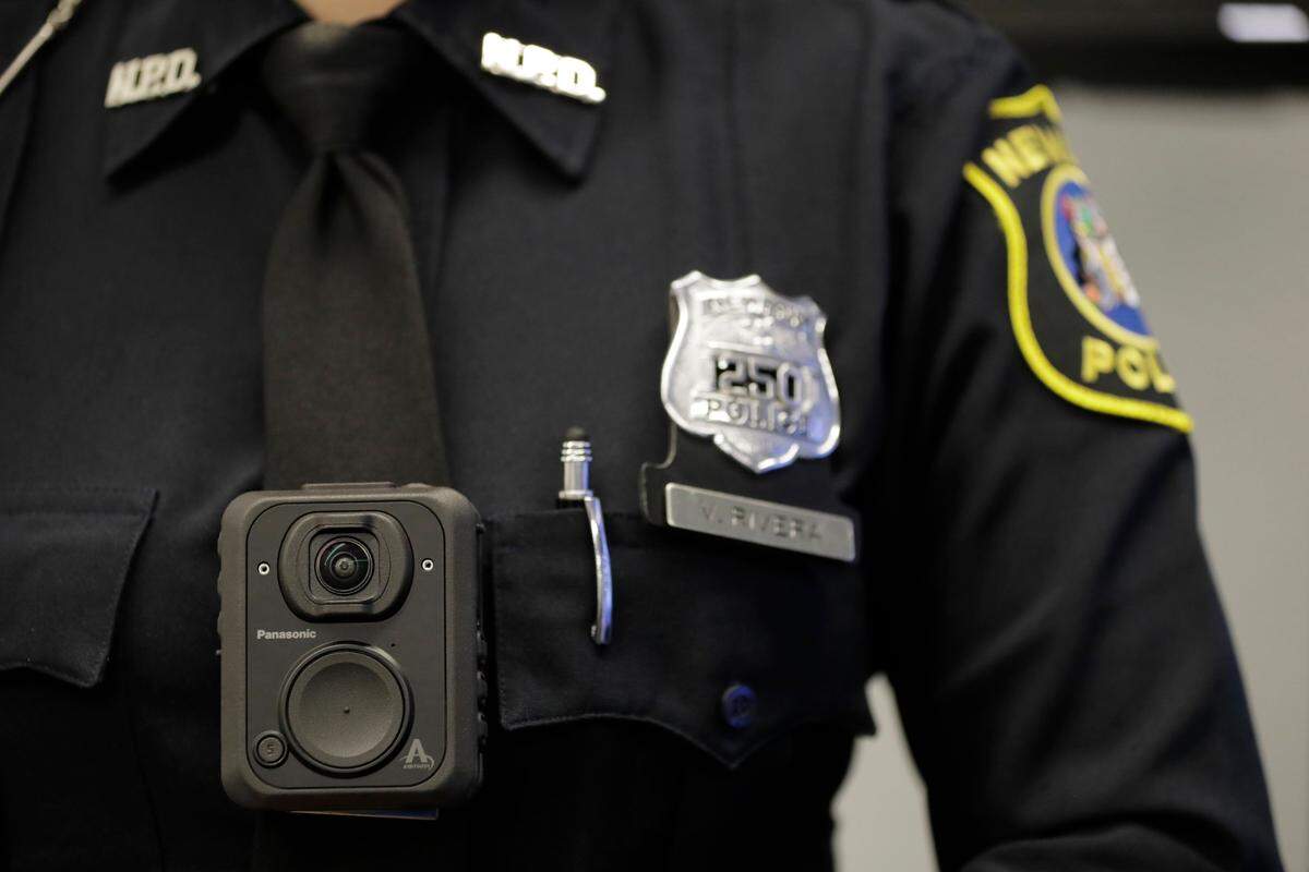 This 2017 file photo by the Associated Press shows a Panasonic body camera being work by Newark, New Jersey, police officer Veronica Rivera.