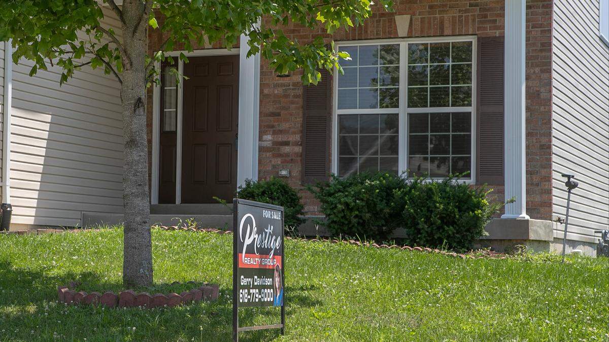 A home sits for sale in O’Fallon, Ill., in this photo from July 2021. See home values for your metro-east zip code with this interactive graphic.