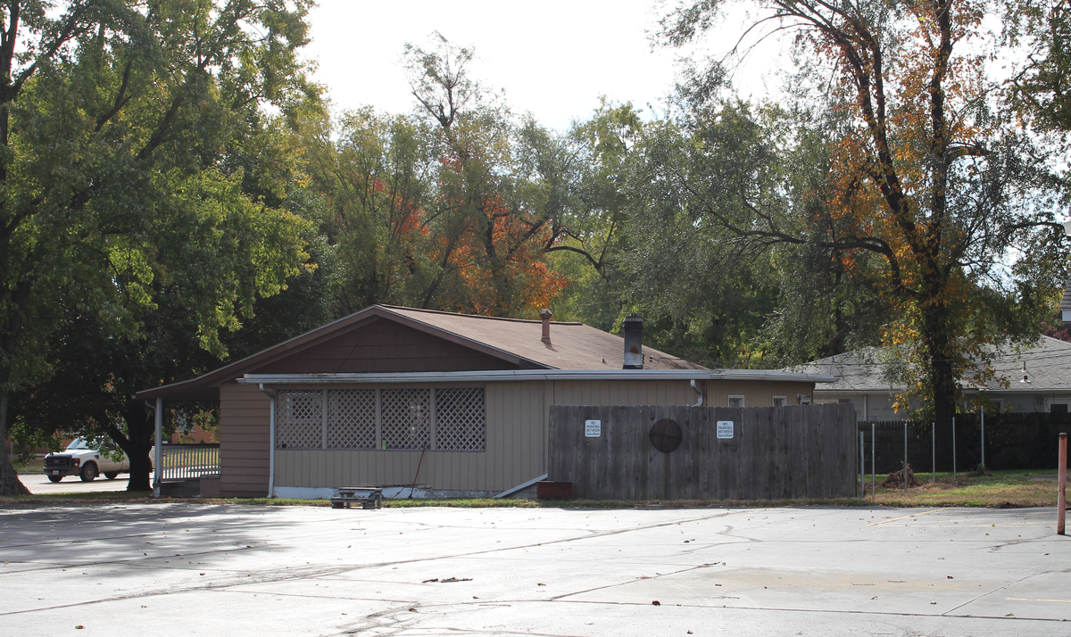 The former Dandy Inn building in Fairview Heights, along with this small home behind it, will be demolished next year to make way for a Moto convenience store.