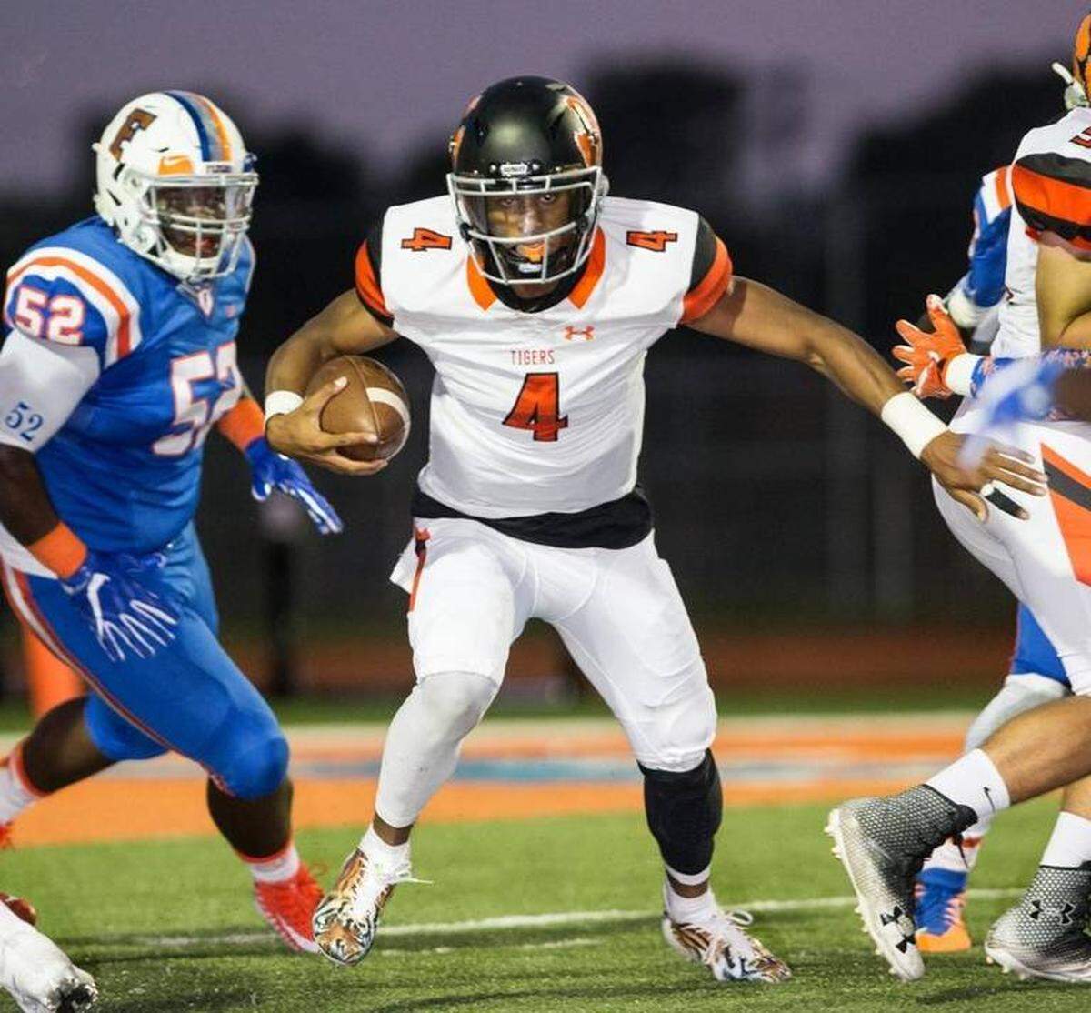 Edwardsville’s Kendall Abdur-Rahman carries the ball during against East St. Louis last season. The two tangle again Friday.