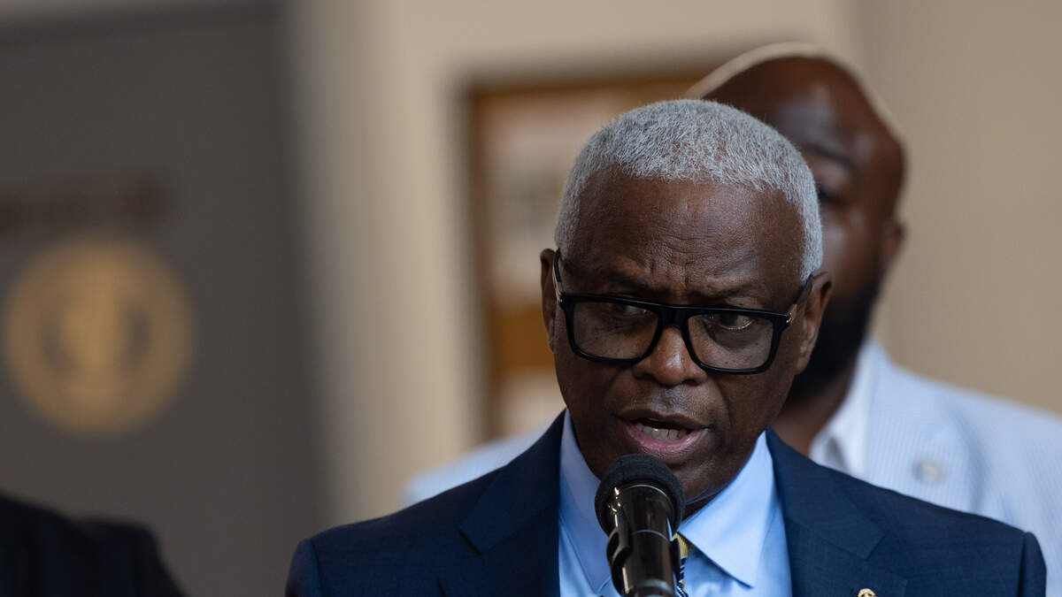 East St. Louis City Manager Robert Betts speaks during a news conference hosted by law enforcement, resource advocates and community faith leaders in East St. Louis regarding the targeted murders of an East St. Louis family.