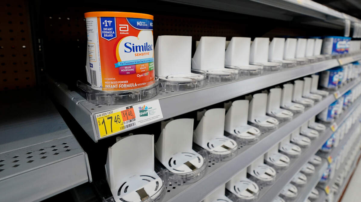 Shelves typically stocked with baby formula sit mostly empty at a store in San Antonio on Tuesday. Parents across the country are scrambling to find baby formula because supply disruptions and a massive safety recall have swept many leading brands off store shelves.