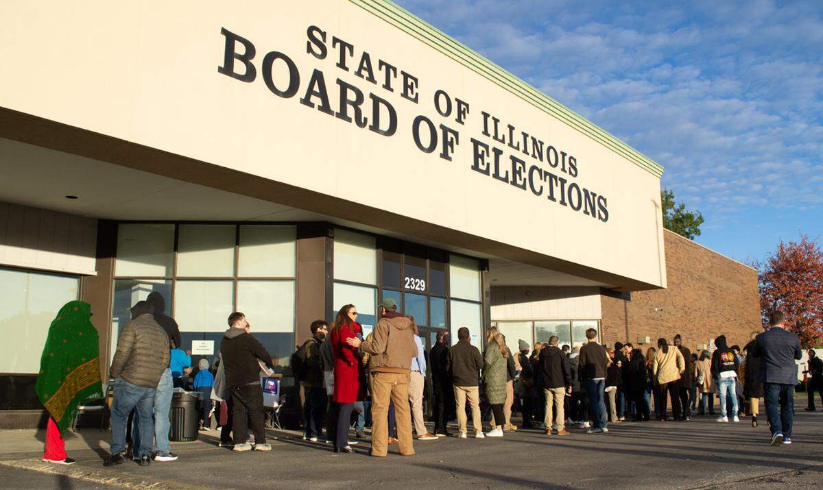 Prospective candidates line up outside the Illinois State Board of Elections building in Springfield on Monday, Oct. 27, 2025, to file nominating petitions.