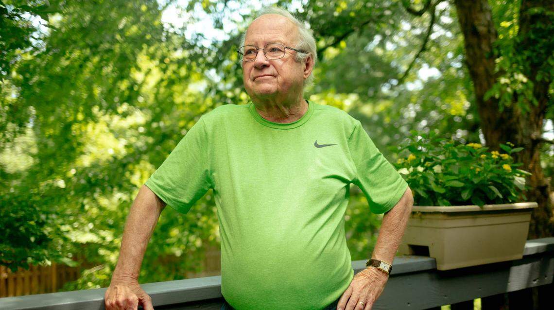 George Maroney, who served as the Carbondale Memorial Hospital administrator for more than 30 years, on July 19 outside his home in Carbondale. Maroney, who believes in abortion being the choice of the patient, was the hospital’s leader when its board voted to ban elective abortions in 1985.