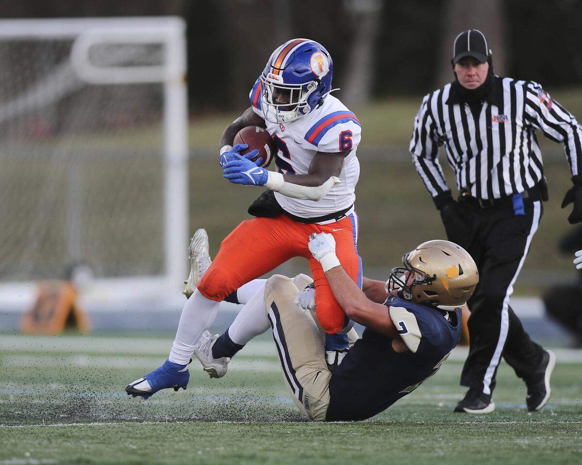 East St. Louis running back TaRyan Martin carries the ball during the IHSA Class 6A semifinals against Lemont. Martin helped lead the Flyers to a 32-29 victory and a spot in the state championship game.