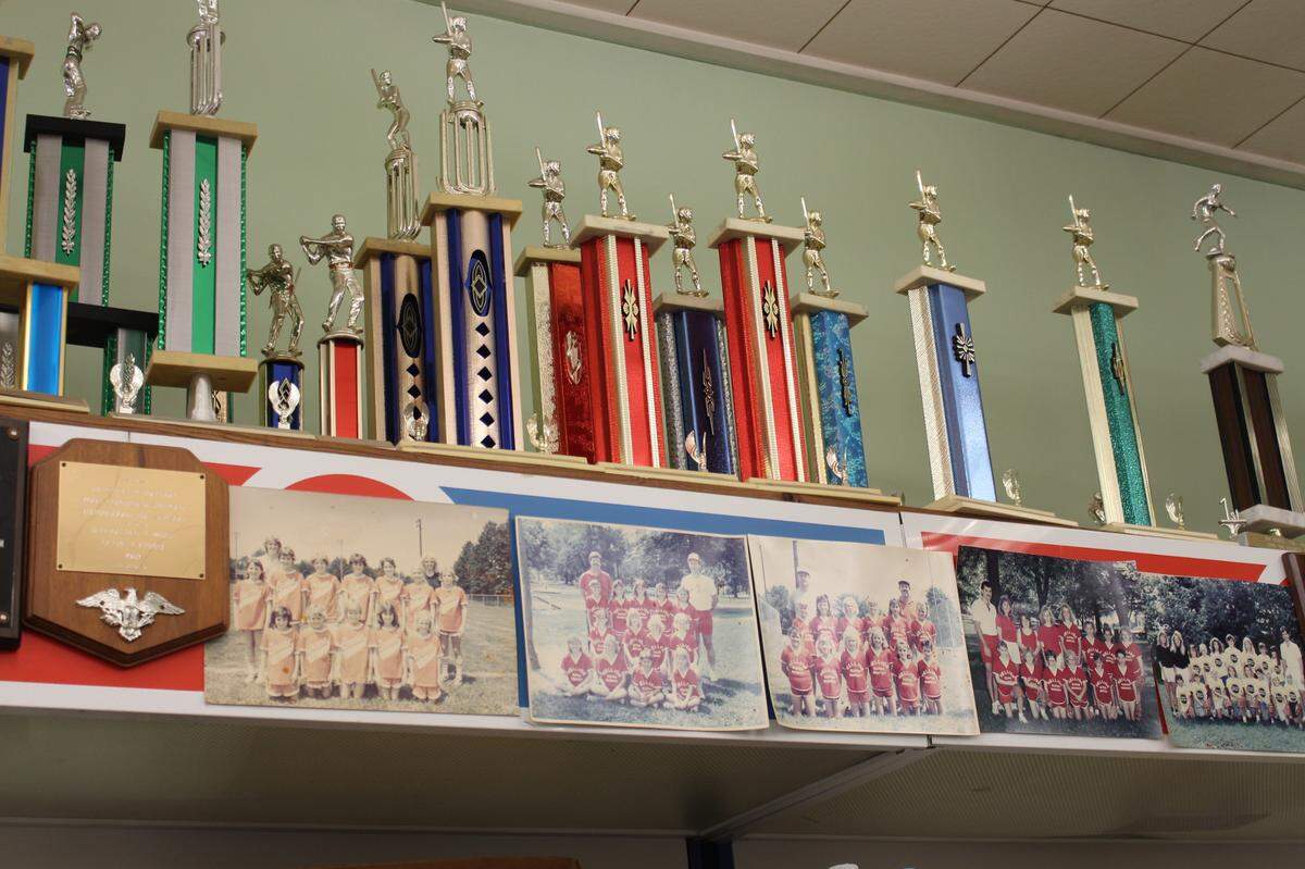 Hellige’s Super Market & Lockers in Breese displays trophies won by Little League teams that the store has sponsored over the years.