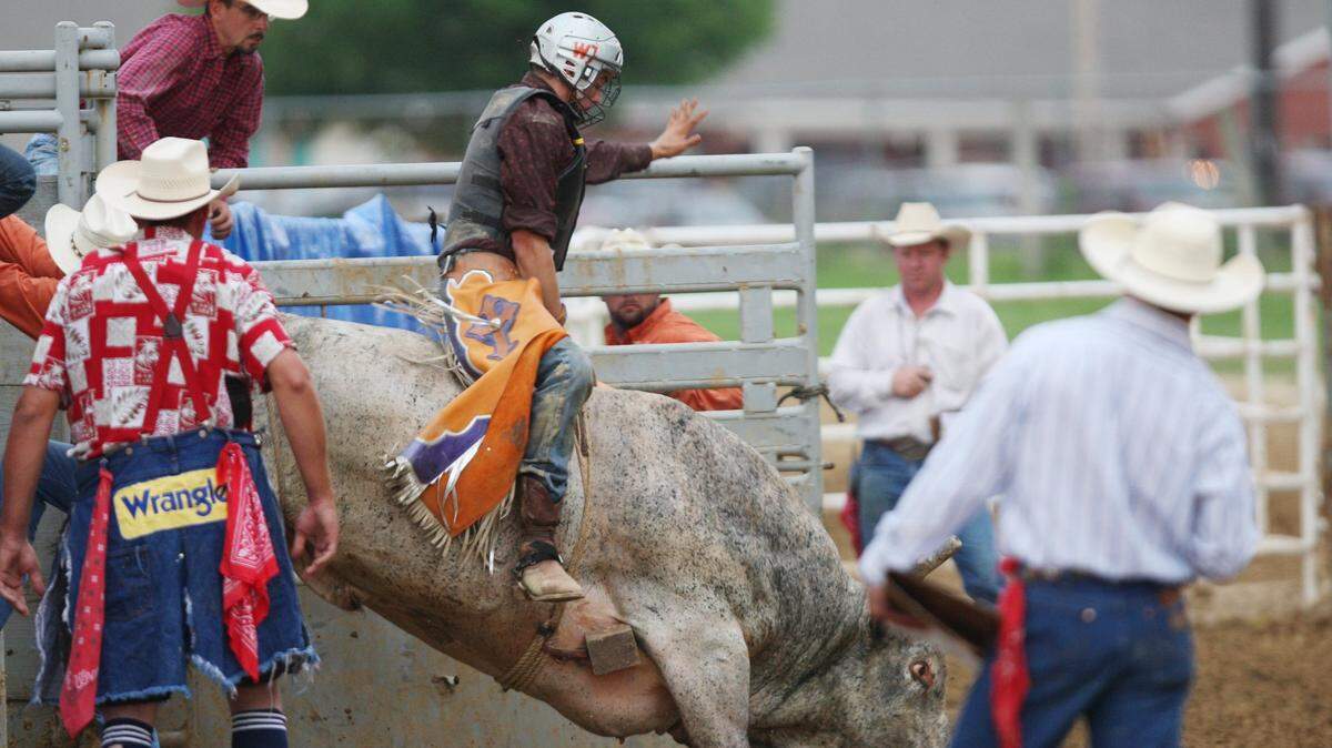 Bullrider Jason Cronk from New Baden comes out of the gate during the Jersey County Fair. The fair begins 9 a.m. Tuesday, July 10, and runs through Sunday, July 15, 2018, at the Jersey County Fairgrounds.