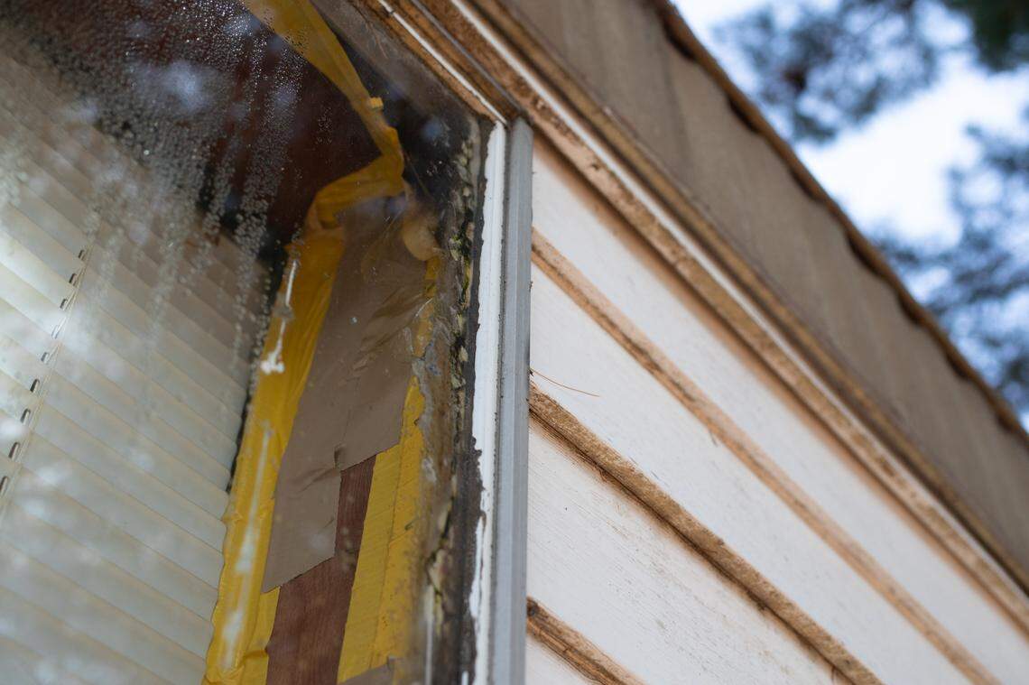 Tape attempts to repair a window at Greenmount Station resident Patty Totty’s rented mobile home.