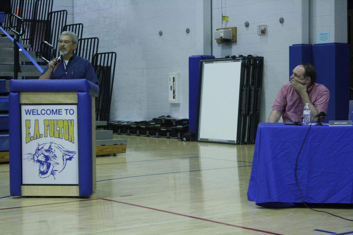 Ron Davinroy, of O'Fallon, speaks Monday night during the 90-minute public comment period at the O'Fallon School District 90 Board of Education meeting at Fulton Jr. High School. Davinroy spoke to defend his longtime friend, Steve Springer, a school board member under fire for comments he made about transgender and Muslim students in 2016 emails, among other things.