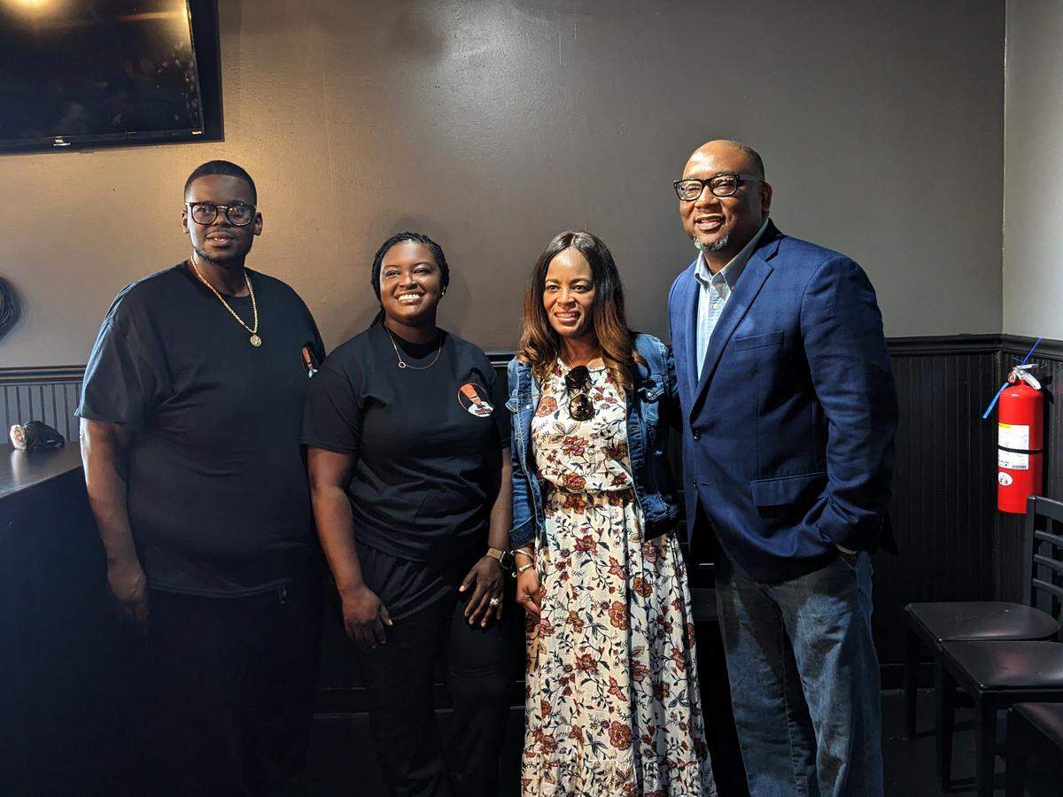 Ray and Diane Watson with Dr. Stephanie Belt and Sen. Chris Belt at the ribbon-cutting event for Ray’s SoulFood & Turkey Legs in O’Fallon