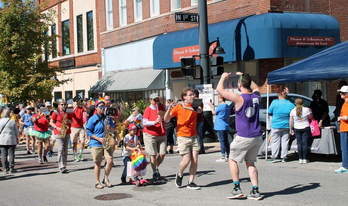 Musicians from the St. Louis-based BandTogether march down West Main Street in Belleville, performing “Born This Way” by Lady Gaga during the Metro East Pride Fest in 2022. 